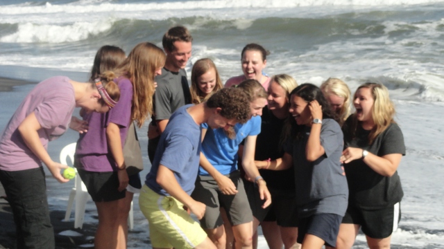 Candid of the team at the beach. Never a dull moment!